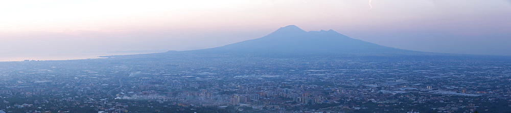 Panoramic view of the city of Naples and Mount Vesuvius at sunset, Campania, Italy, Europe