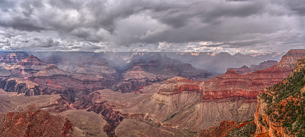Panorama of a rain storm over the North Rim of Grand Canyon National Park, Arizona, USA