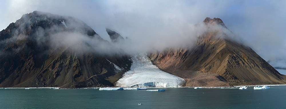 Panorama image of glacier fingers coming down to seashore, Nunavut and Northwest Territories, Canada, North America