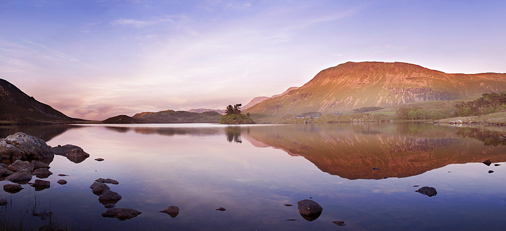 Cregennan lakes and mountain reflection at sunset in Snowdonia National Park, North Wales, United Kingdom, Europe