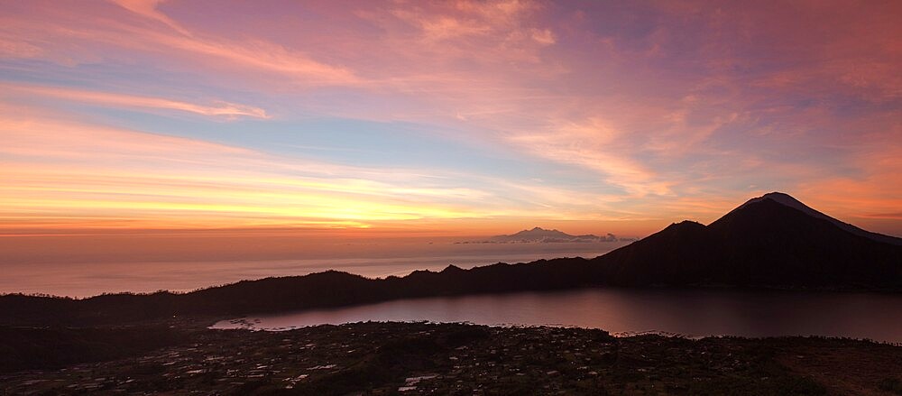 Pink panoramic sunrise from the top of Batur volcano, Bali, Indonesia, Southeast Asia, Asia