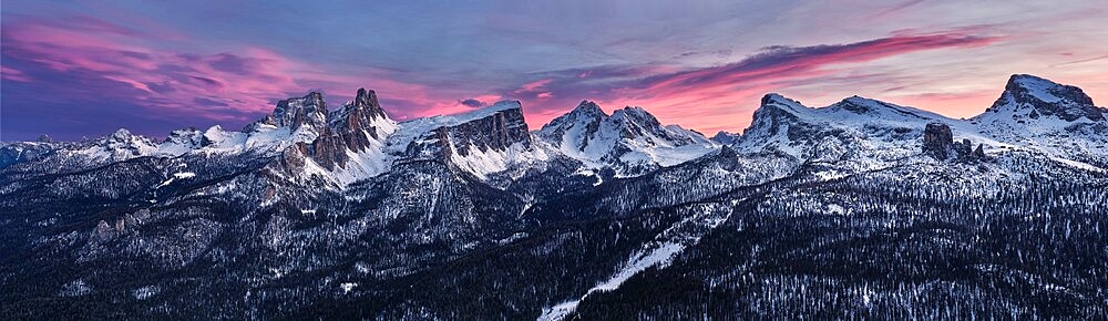 Panoramic at sunset of Dolomites of Cortina d'Ampezzo covered by snow, Croda da Lago, Pelmo, Five Towers (Cinque Torri), Trentino-Alto Adige, Italy, Europe