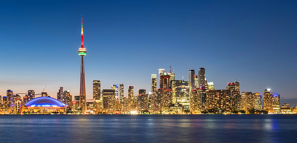 Toronto skyline featuring the CN Tower at night across Lake Ontario, Toronto, Ontario, Canada, North America