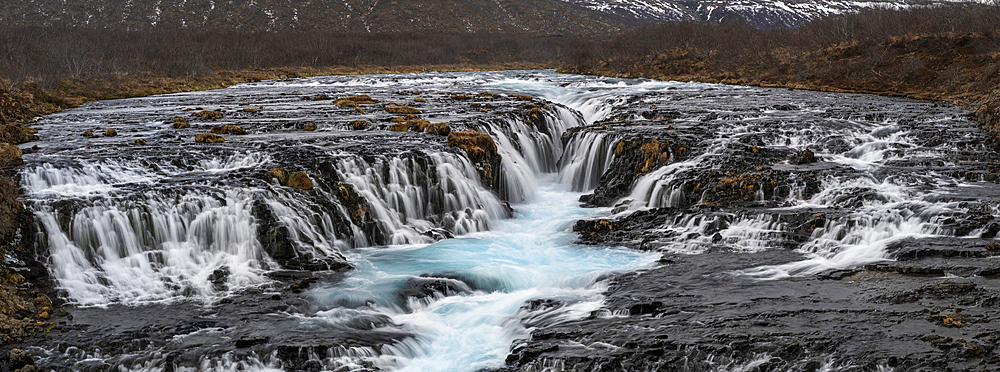 Wide Panoramic view of the Blue Waters of Bruarfoss Waterfall, Bruarfoss, Iceland