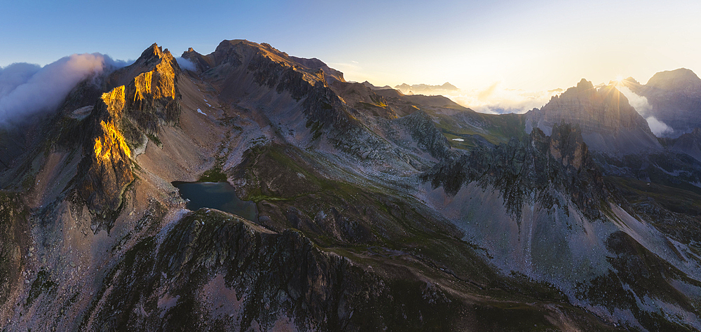 Aerial and panoramic view of Grand Serù and Mont Thabor at sunrise during summer, Provence Alps Cote d’Azur, Haute Alps, Vallee Etroite, France, Europe