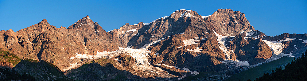 Beautiful panorama of the Monte Rosa massif South side summits at sunset, viewed from Alagana Valsesi, Alpe Pastore, Piedmont, Italy, Europe