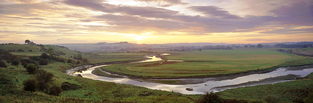 Meandering River Aln at sunset, Foxton, near Alnmouth, Northumberland, England, UK