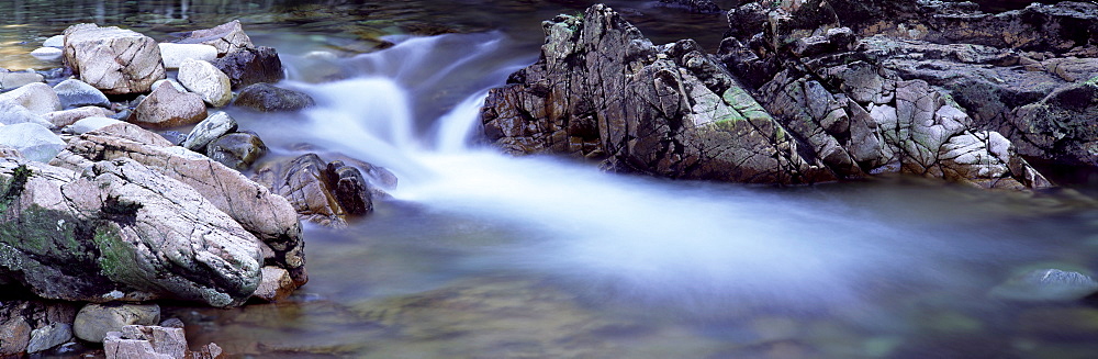 River Nevis flowing between rocks, Glen Nevis, near Fort William, Western Highlands, Scotland, United Kingdom, Europe