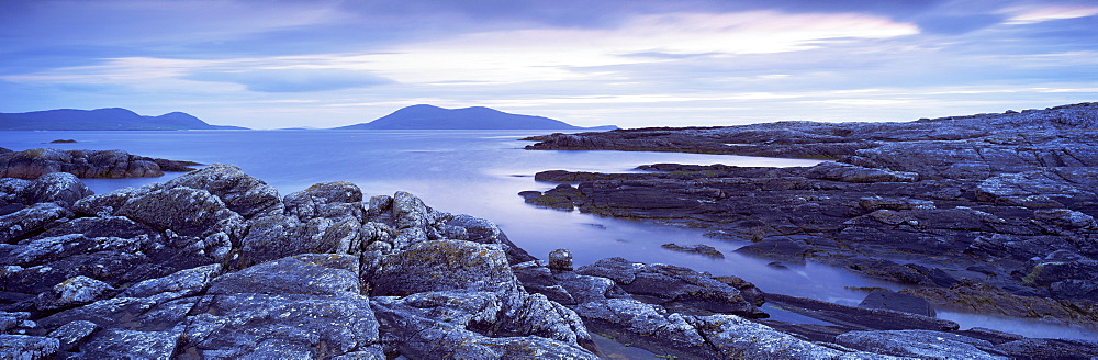 View from Taransay at twilight towards the Uists, off Harris, Outer Hebrides, Scotland, United Kingdom, Europe