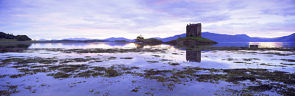 Castle Stalker at sunset, near Oban, Highland region, Scotland, United Kingdom, Europe