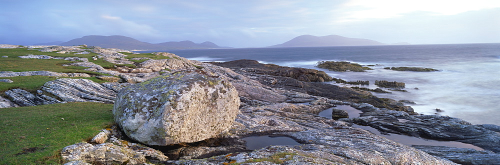 View towards the southern tip of the Isle of Harris from Taransay at dusk, Outer Hebrides, Scotland, United Kingdom, Europe