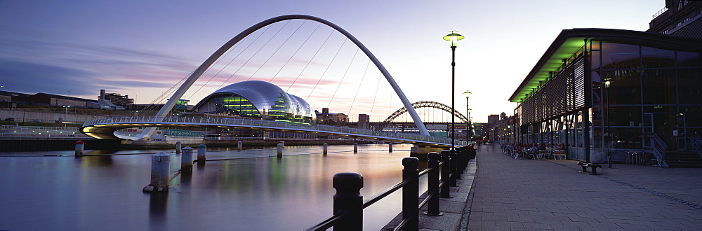 Dusk view towards Millennium Bridge, Tyne Bridge and Sage Music Hall, Quayside, River Tyne, Newcastle upon Tyne, Tyne and Wear, England, United Kingdom, Europe