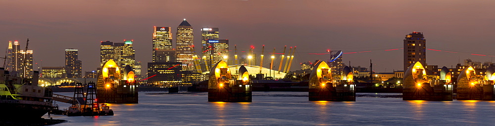 Thames Flood Barrier with Docklands and Canary Wharf panorama from Woolwich, London, England, United Kingdom, Europe 