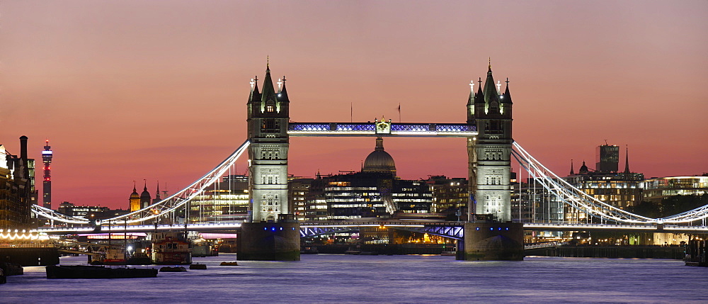 Panoramic view of Tower Bridge framing St. Paul's Cathedral at dusk, London, England, United Kingdom, Europe