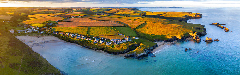 Aerial panorama of Porthcothan Bay and rugged Cornish coastline at dawn, Cornwall, England, United Kingdom, Europe