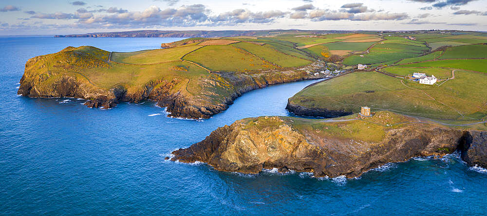 Aerial vista of Doyden Castle on the headland at Port Quin in spring, Cornwall, England, United Kingdom, Europe