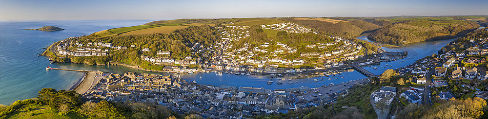 Aerial panoramic view of the beautiful Cornish fishing town of Looe on a sunny spring morning, Looe, Cornwall, England, United Kingdom, Europe