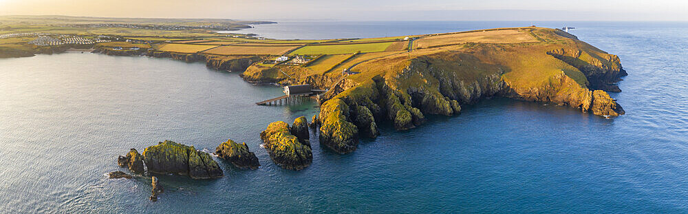 Aerial vista of Merope Rocks, Trevose Head and Padstow Lifeboat Station, North Cornwall, England, United Kingdom, Europe