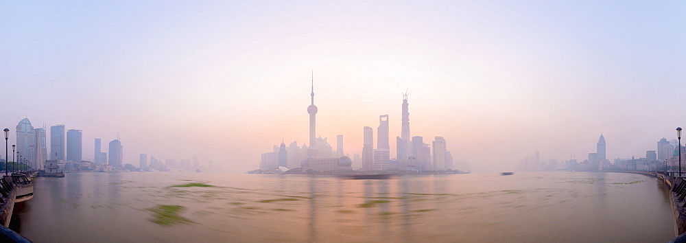 Pudong skyline across Huangpu River, including Oriental Pearl Tower, Shanghai World Financial Center, and Shanghai Tower, Shanghai, China, Asia