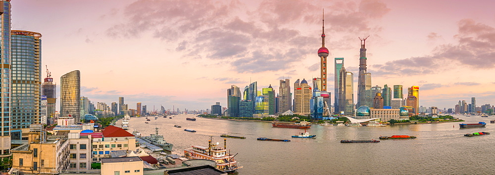 Pudong skyline across Huangpu River, including Oriental Pearl Tower, Shanghai World Financial Center and Shanghai Tower, Shanghai, China, Asia 