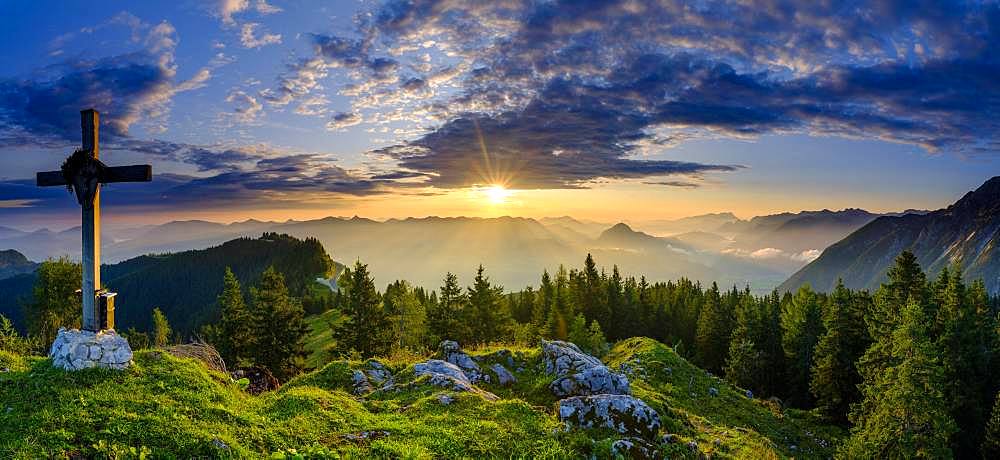 Panorama photo, Ahornbuechsenkopf with summit cross, view at sunrise on alpine panorama, Osterhorn group, Dachstein and Tennen Mountains, Golling, Salzburger Land, Austria, Europe