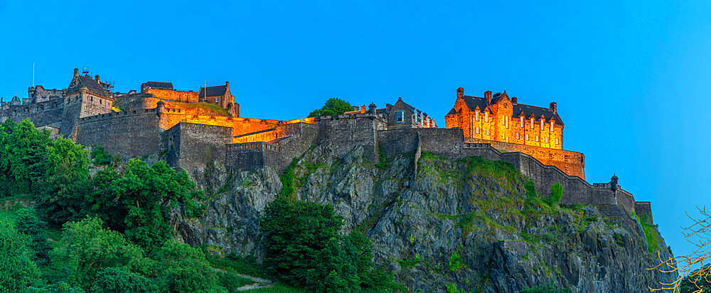 View of Edinburgh Castle from Princes Street at dusk, UNESCO World Heritage Site, Edinburgh, Scotland, United Kingdom, Europe