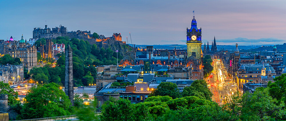 View of Edinburgh Castle, Balmoral Hotel and Princes Street from Calton Hill at dusk, UNESCO World Heritage Site, Edinburgh, Lothian, Scotland, United Kingdom, Europe