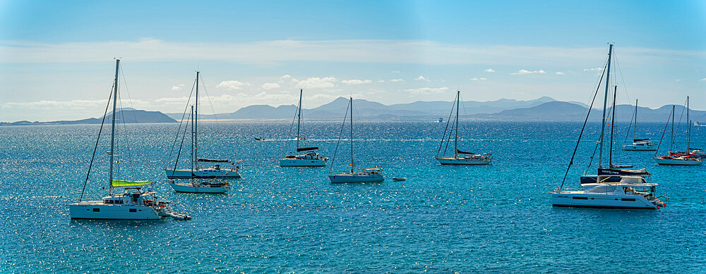 View of watersport, sailboats and Fuerteventura in background, Playa Blanca, Lanzarote, Canary Islands, Spain, Atlantic, Europe