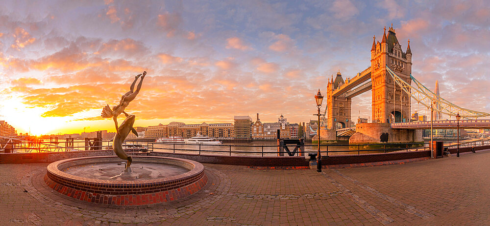 Panoramic view of Tower Bridge, Girl with Dolphin, The Shard and River Thames at sunrise, London, England, United Kingdom, Europe