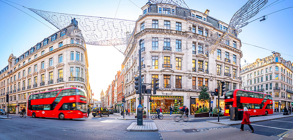 View of red buses on Regent Street at Christmas, London, England, United Kingdom, Europe