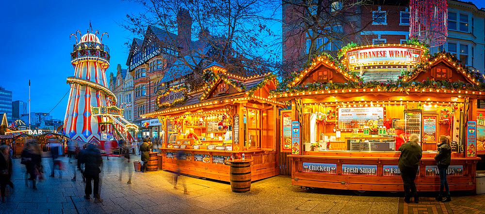 View of Christmas market stalls and helter skelter on Old Market Square, Nottingham, Nottinghamshire, England, United Kingdom, Europe