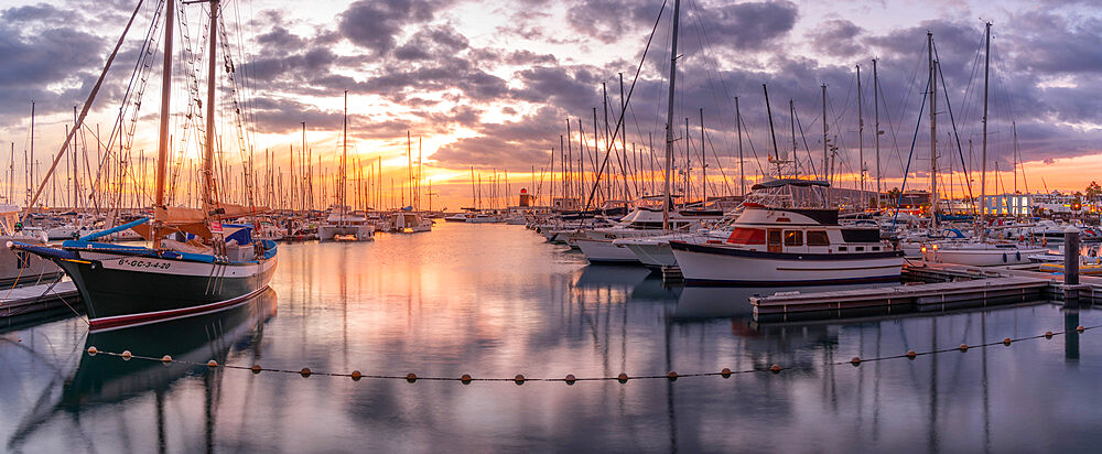 View of boats and Marina Rubicon Shopping Center in Rubicon Marina at sunset, Playa Blanca, Lanzarote, Canary Islands, Spain, Atlantic, Europe