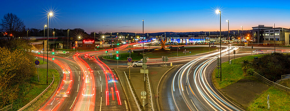 View of trail lights on Hornsbridge Roundabout at dusk, Chesterfield, Derbyshire, England, United Kingdom, Europe