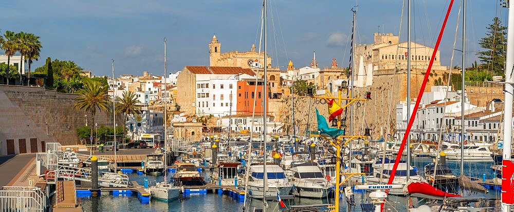 View of boats in marina and Catedral de Santa Maria de Menorca in background, Ciutadella, Memorca, Balearic Islands, Spain, Europe