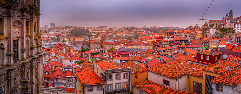 View of the Igreja dos Grilos Church and terracota rooftops of The Ribeira district at sunset, UNESCO World Heritage Site, Porto, Norte, Portugal, Europe