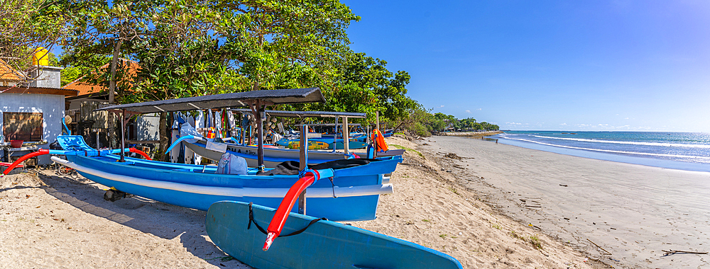 View of fishing outrigger overlooking Kuta Beach, Kuta, Bali, Indonesia, South East Asia, Asia