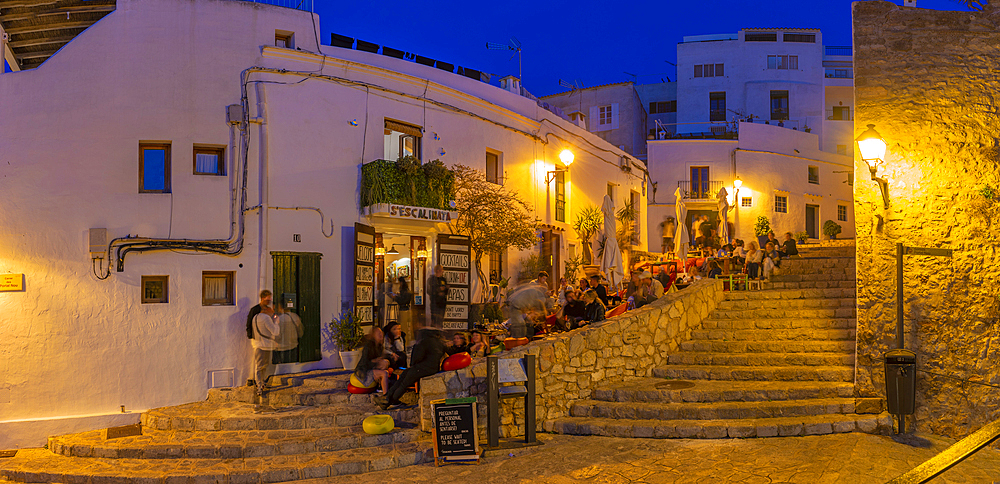 View of restaurants and bars in Dalt Vila at dusk, UNESCO World Heritage Site, Ibiza Town, Eivissa, Balearic Islands, Spain, Mediterranean, Europe