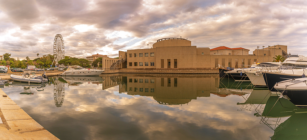 View of Archaeological Museum of Olbia and harbour boats on sunny day in Olbia, Olbia, Sardinia, Italy, Mediterranean, Europe