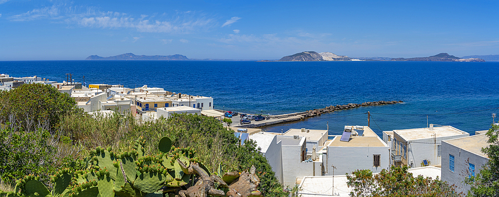 View of rooftops and the sea in the town of Mandraki, Mandraki, Nisyros, Dodecanese, Greek Islands, Greece, Europe