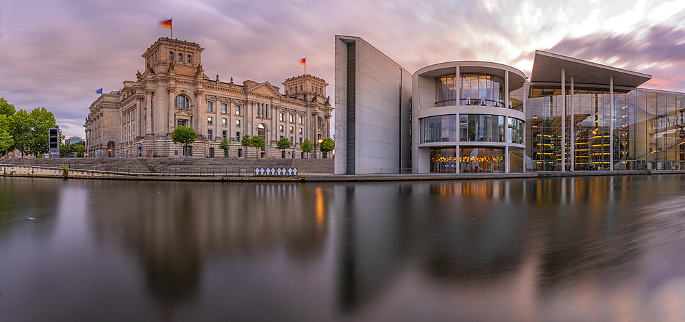 View of the River Spree and the Reichstag (German Parliament building) and Paul Loebe Building at sunset, Mitte, Berlin, Germany, Europe