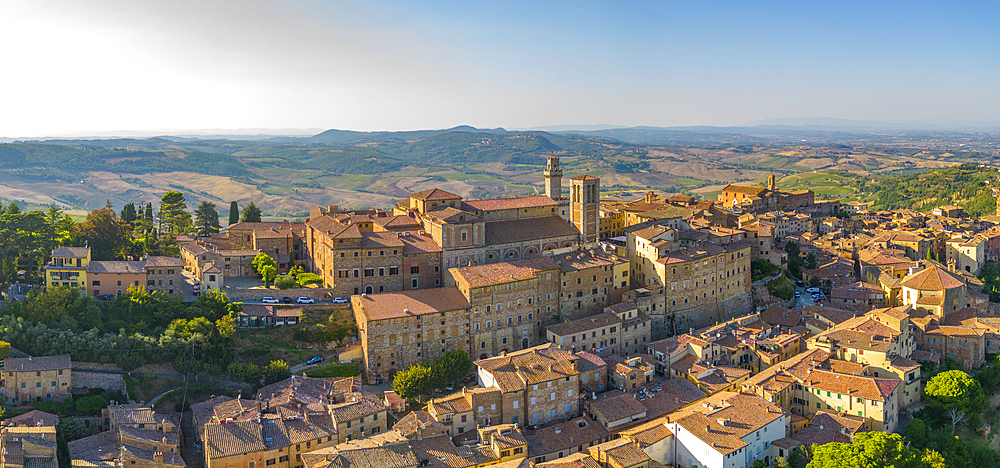 Elevated view of rooftops and town of Montepulciano at sunset, Montepulciano, Tuscany, Italy, Europe