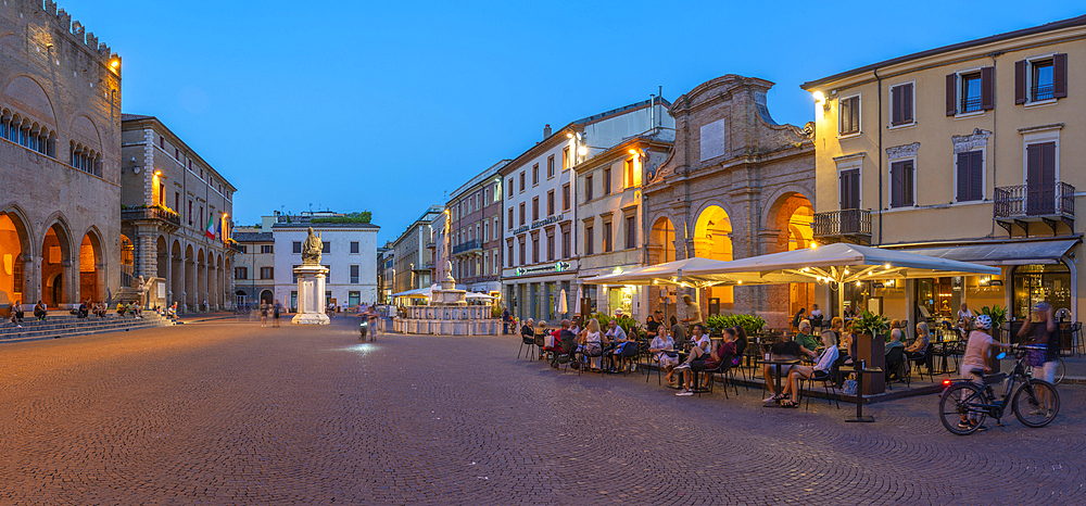 View of restaurant in Piazza Cavour in Rimini at dusk, Rimini, Emilia-Romagna, Italy, Europe