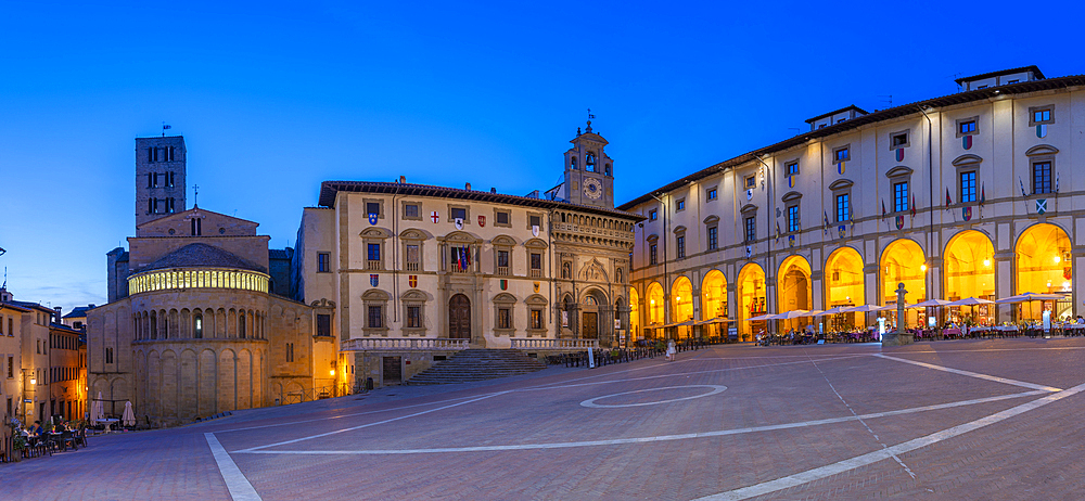 View of architecture in Piazza Grande at dusk, Arezzo, Province of Arezzo, Tuscany, Italy, Europe