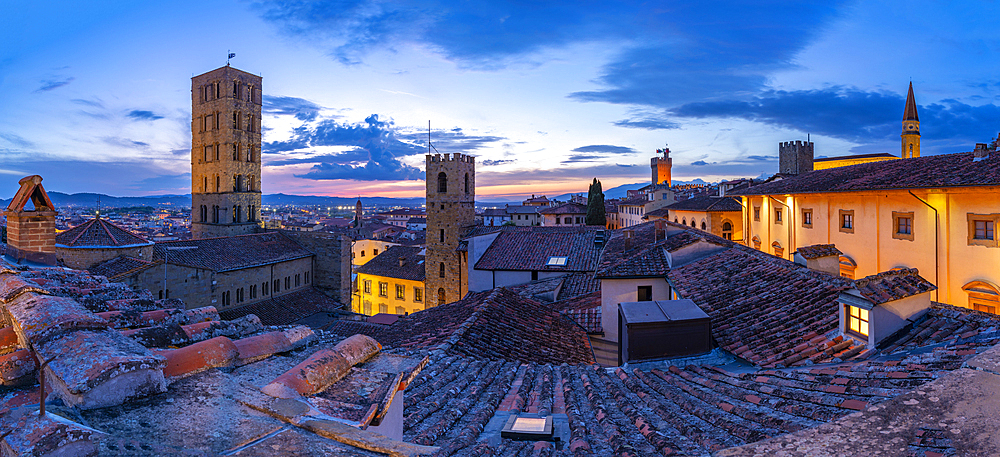 View of city skyline and rooftops from Palazzo della Fraternita dei Laici at dusk, Arezzo, Province of Arezzo, Tuscany, Italy, Europe