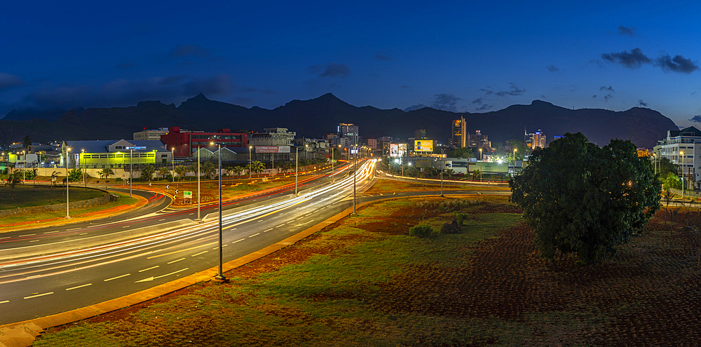 View of trail lights and city skyline in Port Louis at dusk, Port Louis, Mauritius, Indian Ocean, Africa