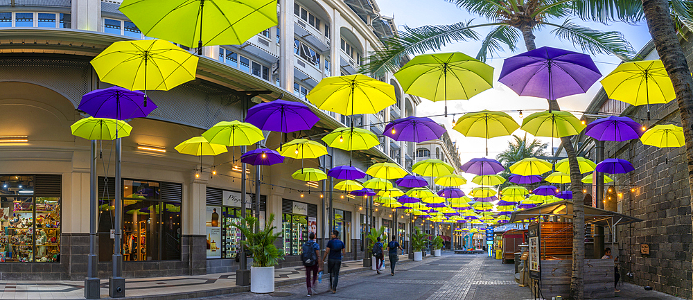 View of Umbrella Square in Caudan Waterfront in Port Louis at sunset, Port Louis, Mauritius, Indian Ocean, Africa