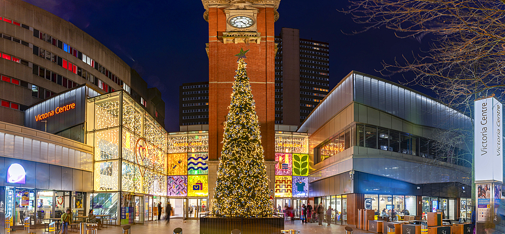 View of Victoria Station Clock Tower and Christmas tree at dusk, Nottingham, Nottinghamshire, England, United Kingdom, Europe