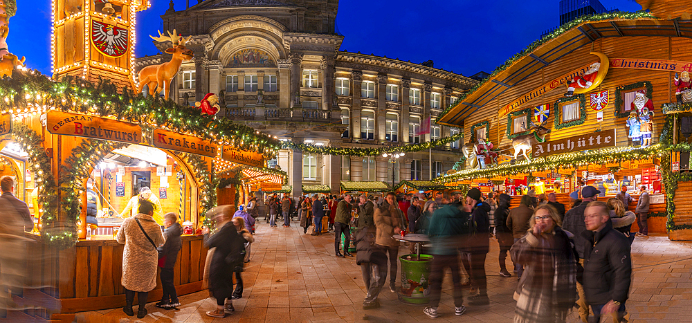 View of Christmas Market stalls in Victoria Square at dusk, Birmingham, West Midlands, England, United Kingdom, Europe