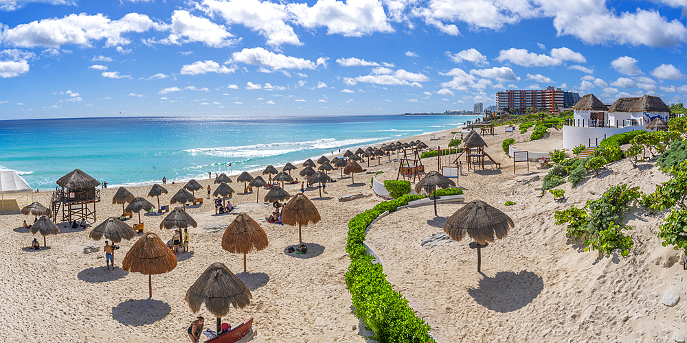 View of long white sandy beach at Playa Delfines, Hotel Zone, Cancun, Caribbean Coast, Yucatan Peninsula, Mexico, North America