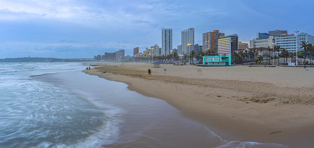 View of beaches, promenade and hotels from New Pier at dusk, Durban, KwaZulu-Natal Province, South Africa, Africa